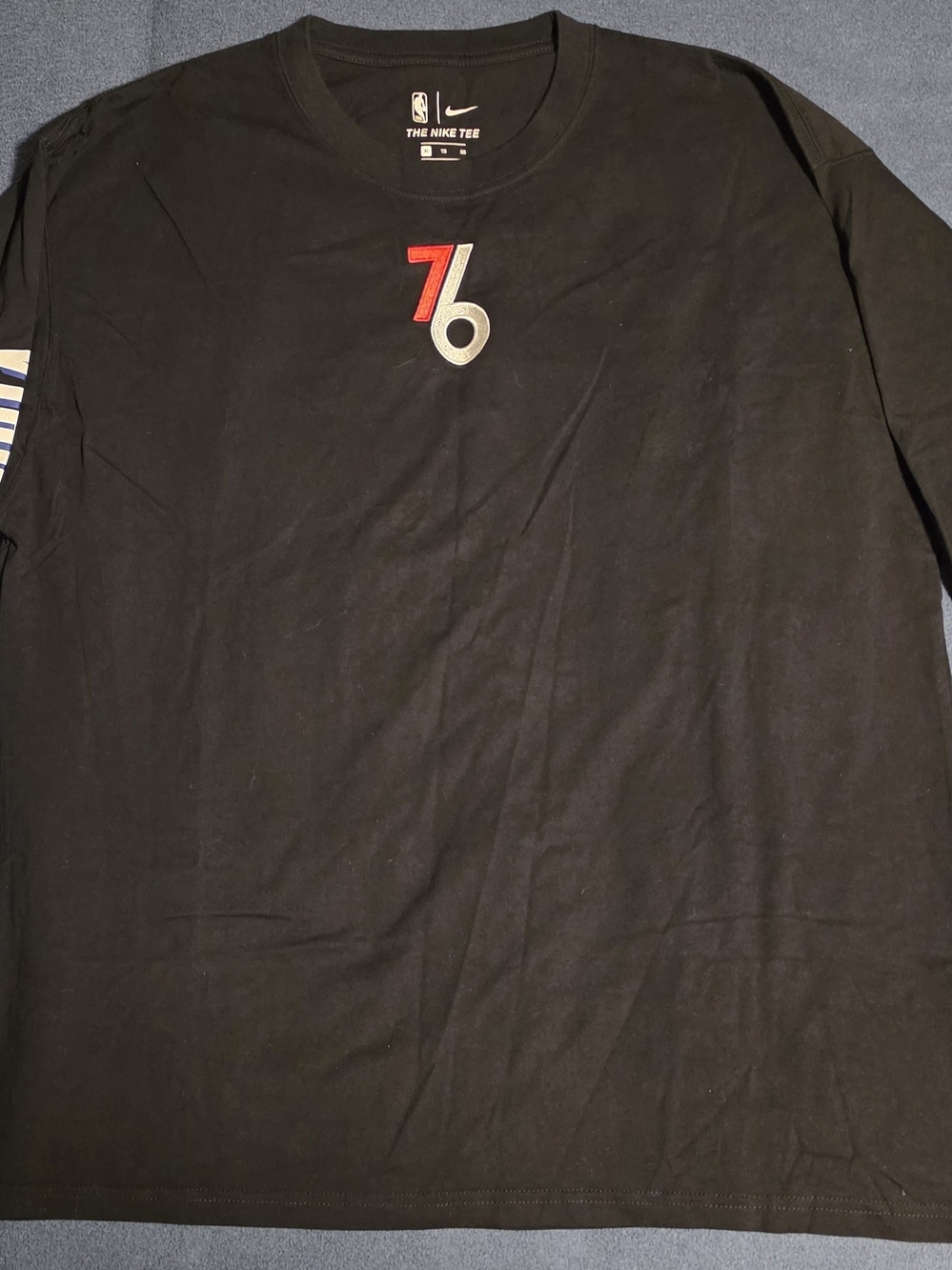 Nike Black Long Sleeve Tee with Blue and White 76ers Logo